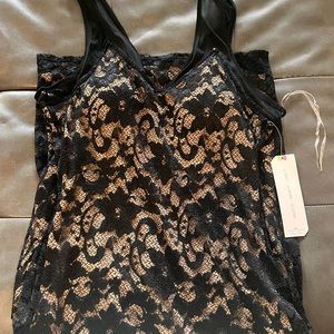 Brand new- black lacy dress with skin color mesh underneath.